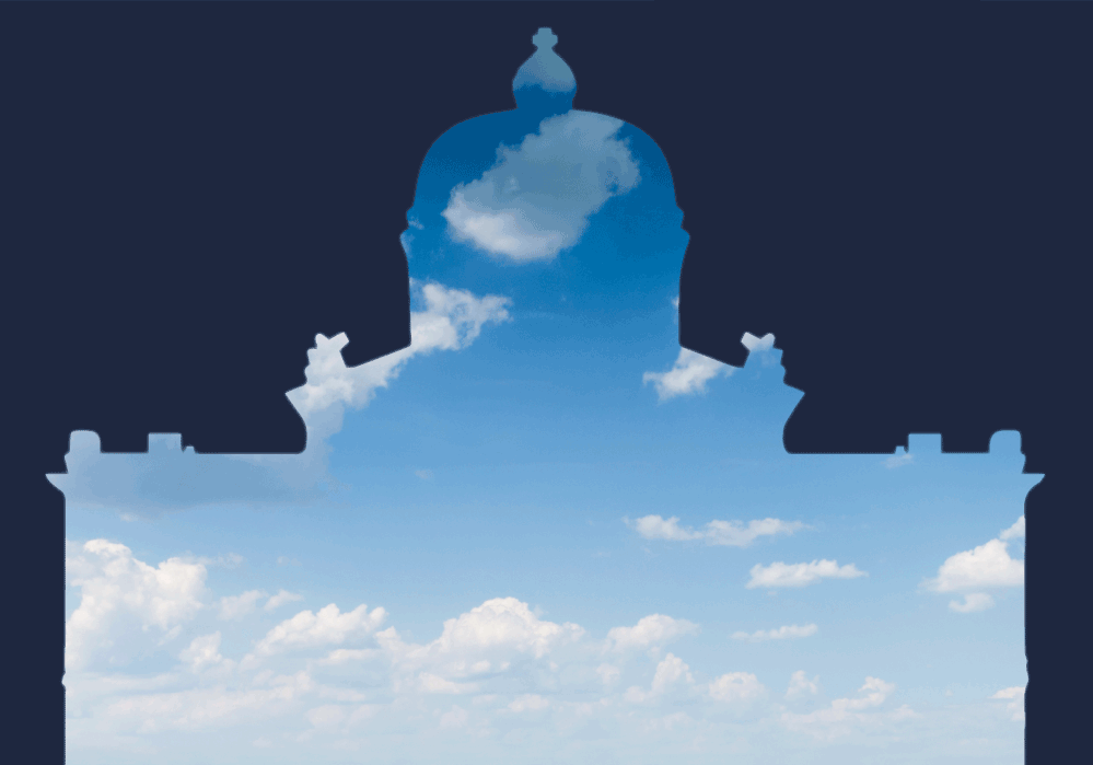 Symbolic image of the silhouette of the Swiss Federal Palace cut into a blue partly cloudy sky.